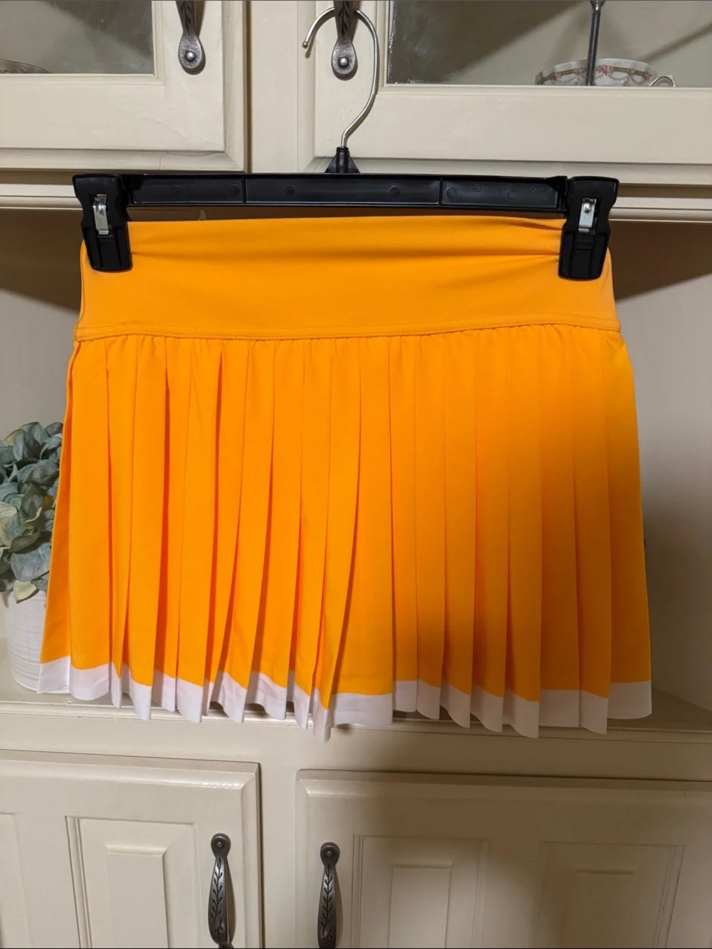 Offline by Aerie Vibrant Orange Pleated Tennis Skort with White Hem - Picture 2 of 5